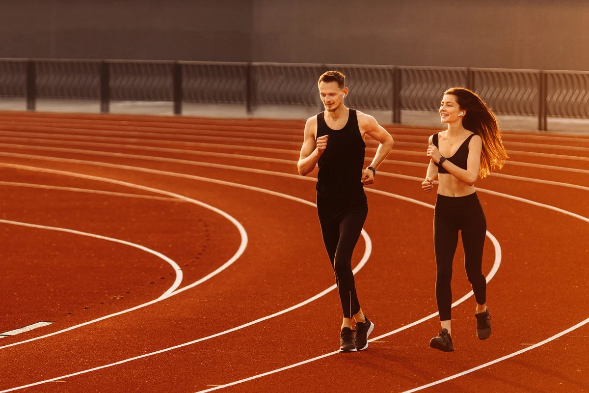 Two young thletes are running