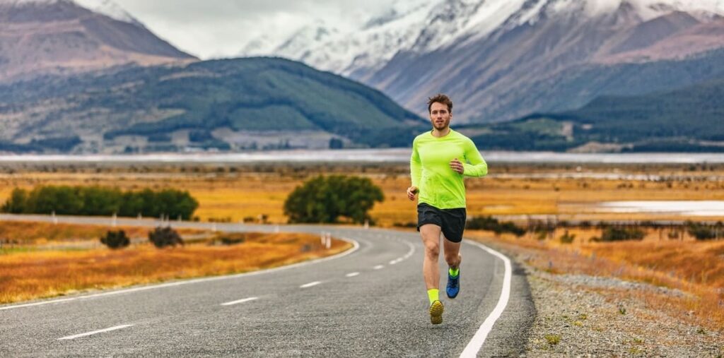 Man running on asphalt