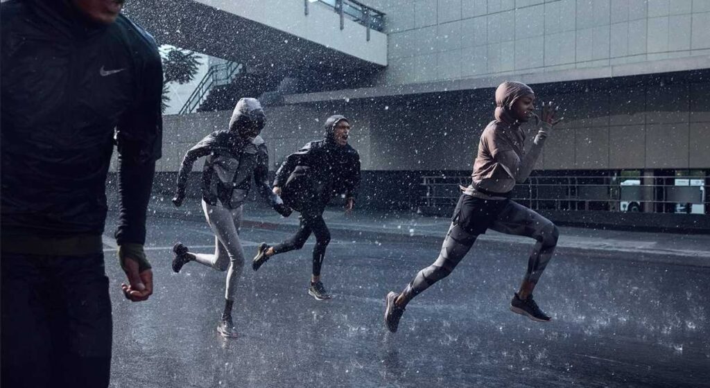 People running in the rain