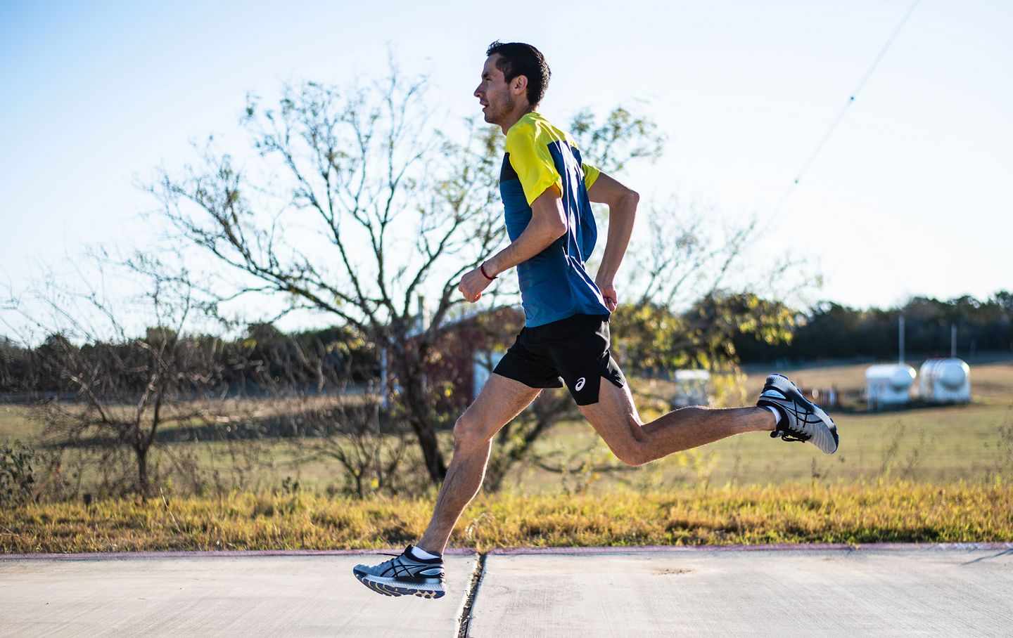 Men running in ASICS Gel-Cumulus Running Shoes