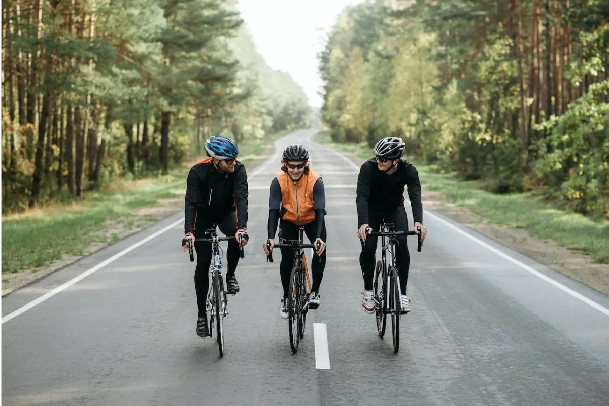 People biking on the road