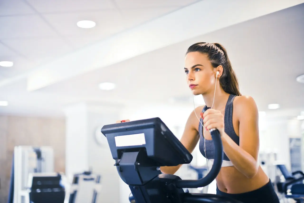Female athlete training on treadmill