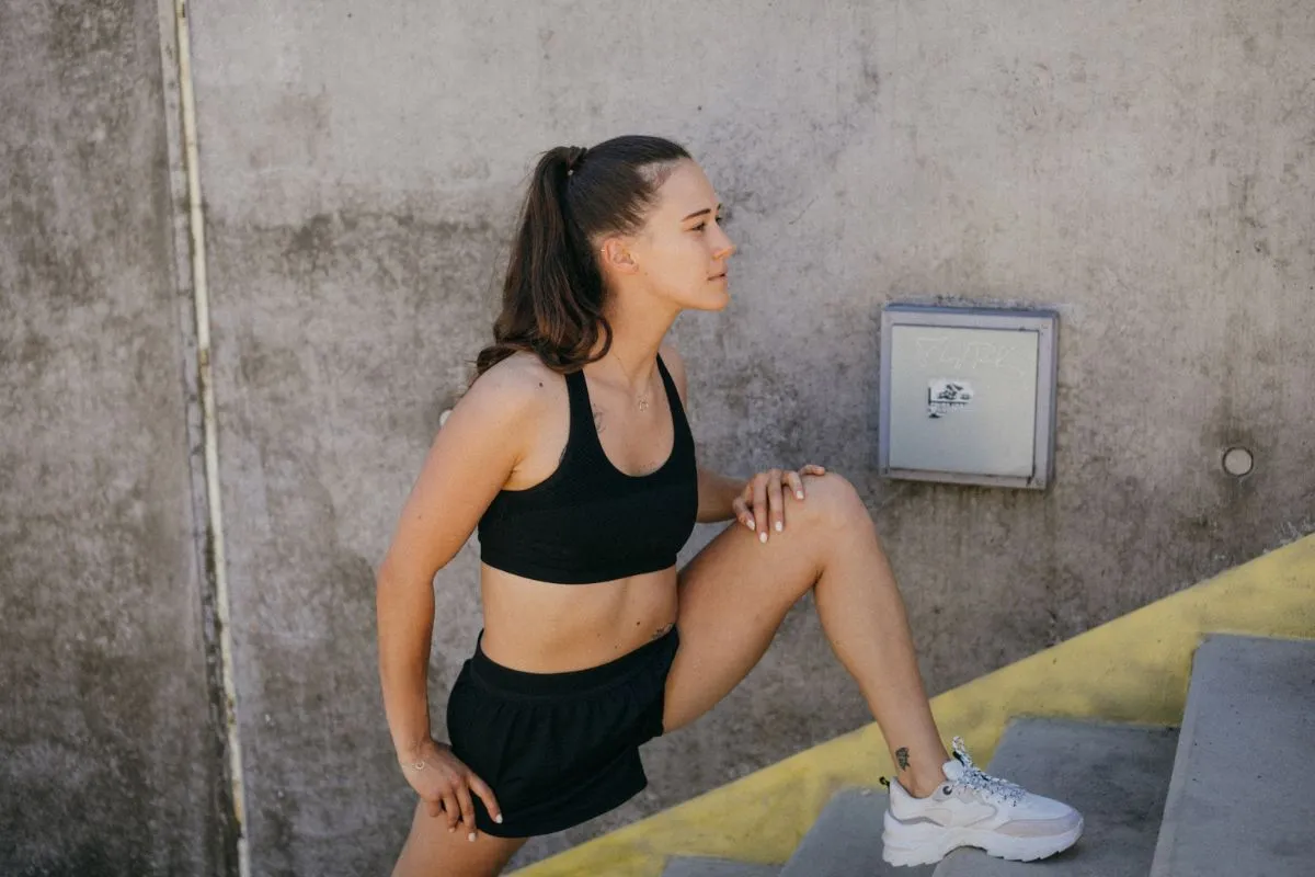 Woman training in short shorts