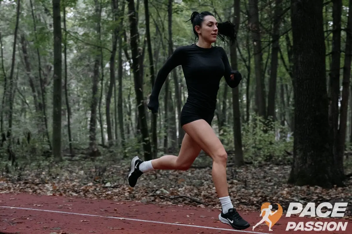 A woman runner is performing a running program for a 10k race
