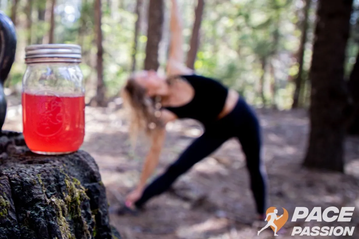 A female runner is doing a warm-up before going out for her run