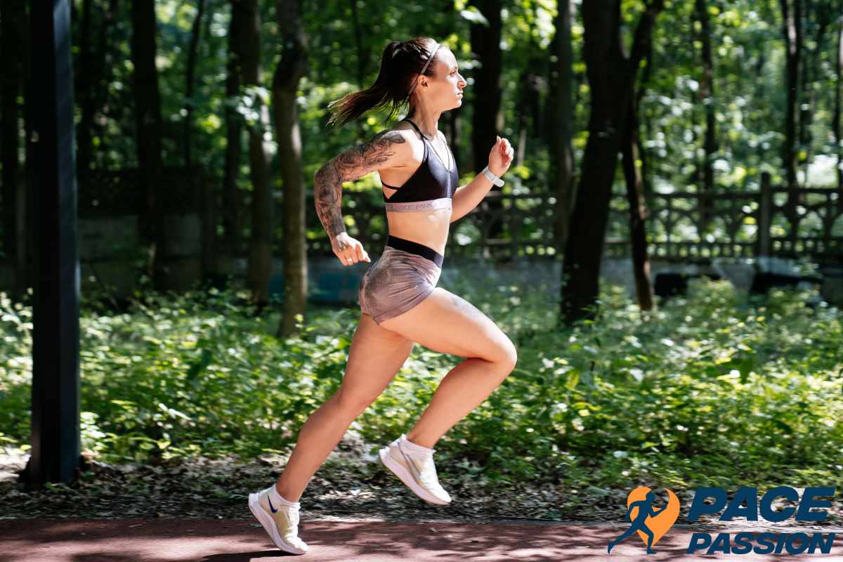 The runner runs on a warm summer day