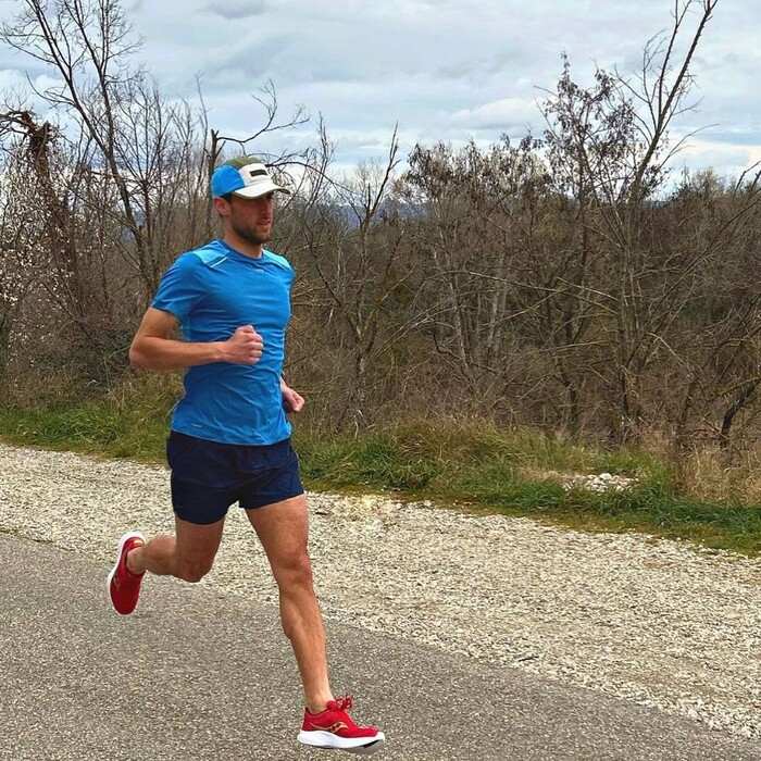 Man running in Saucony Kinvara 14 running shoes