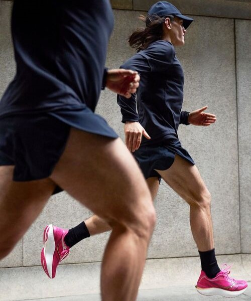 People running while wearing Saucony Endorphin 3 running shoes