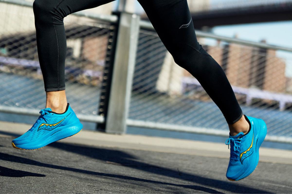 A man running in shoes with a narrow width