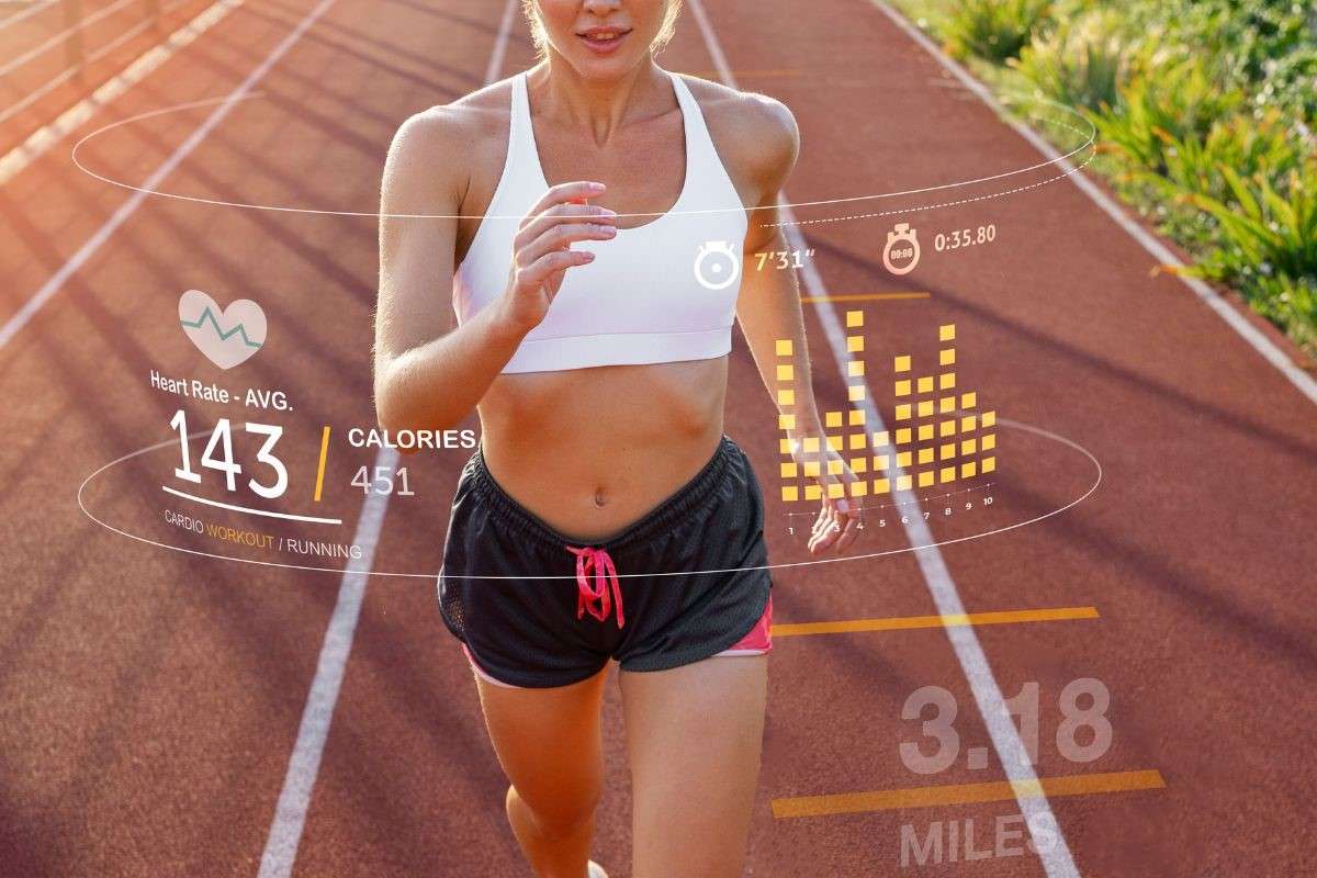 Female runner tracks her steps and other health indicators while training