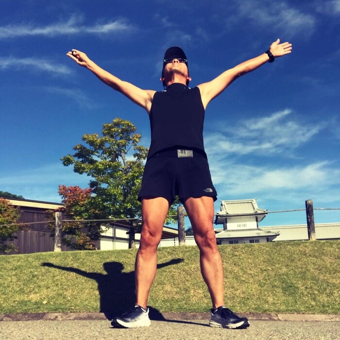 A man runner in Hoka Rincon 3 running shoes