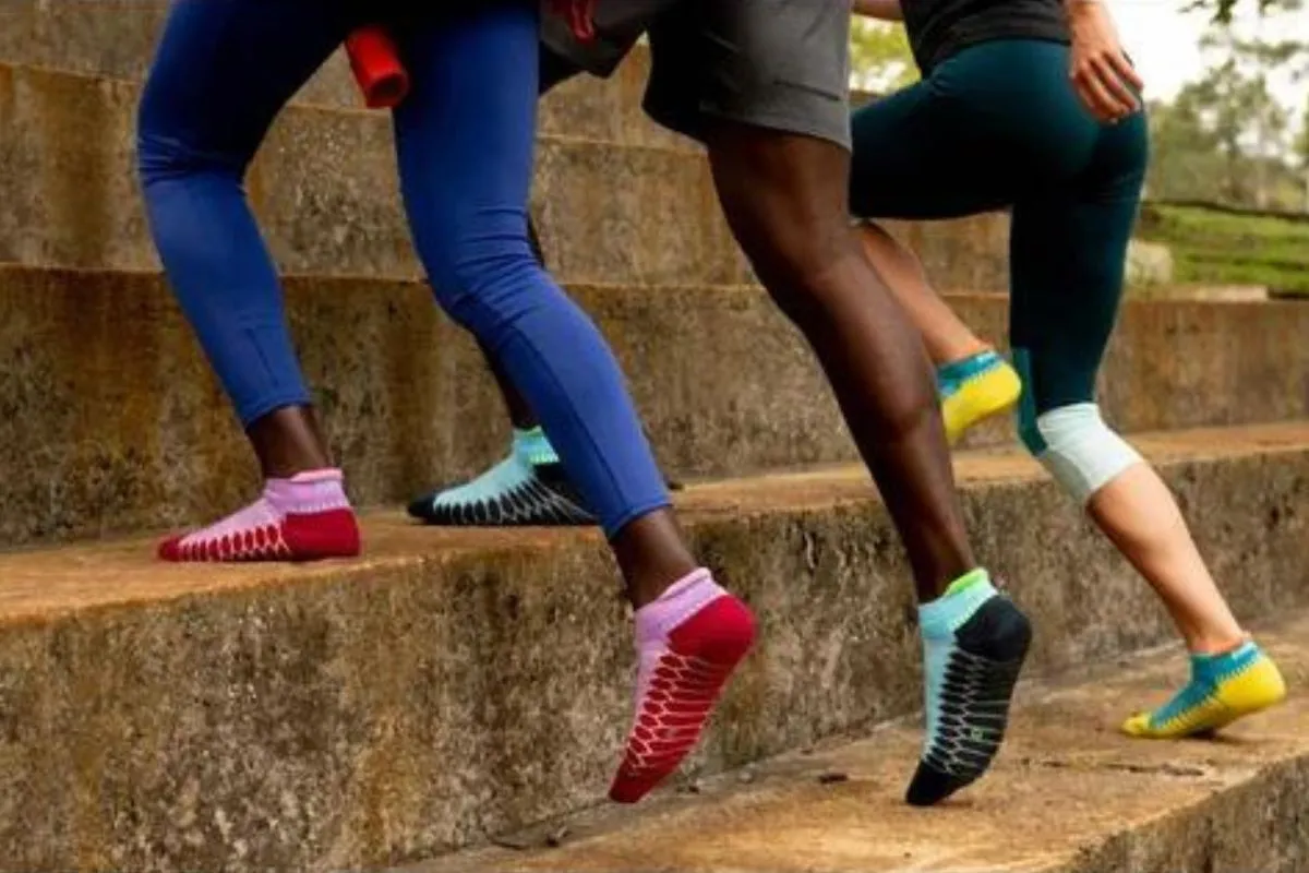 People running in specialized anti blister socks
