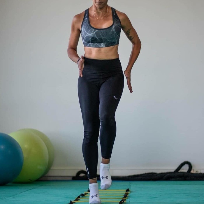 A female in physical activity in Under Armour Socks