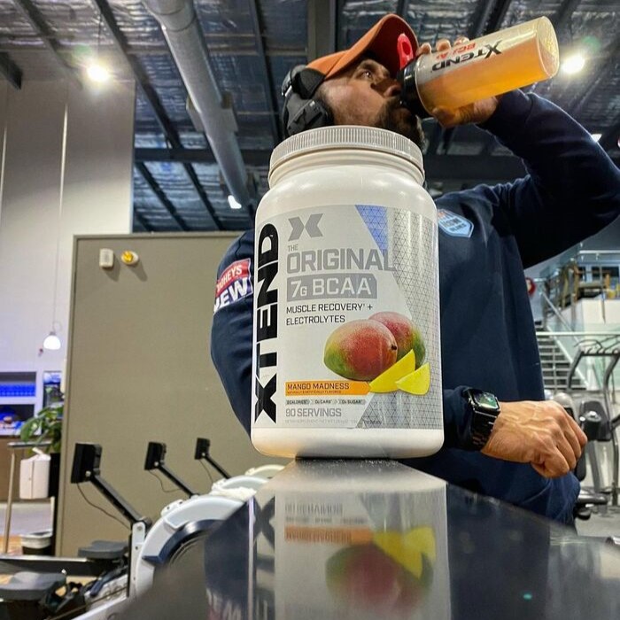 Man drinking XTEND BCAA Powder during workout