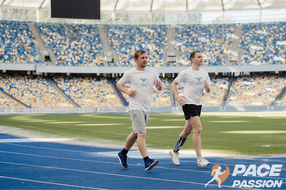 Runners on the outdoor track are running in an 800-meter race