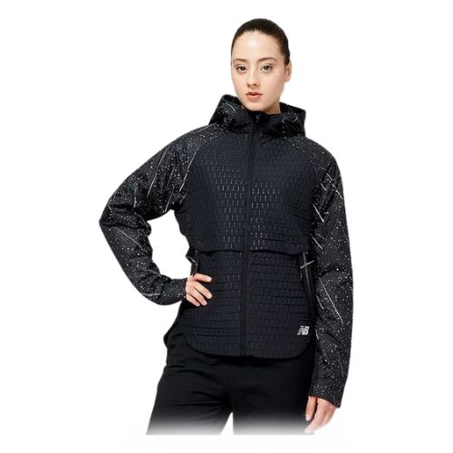 Woman in New Balance reflective print impact run heat jacket