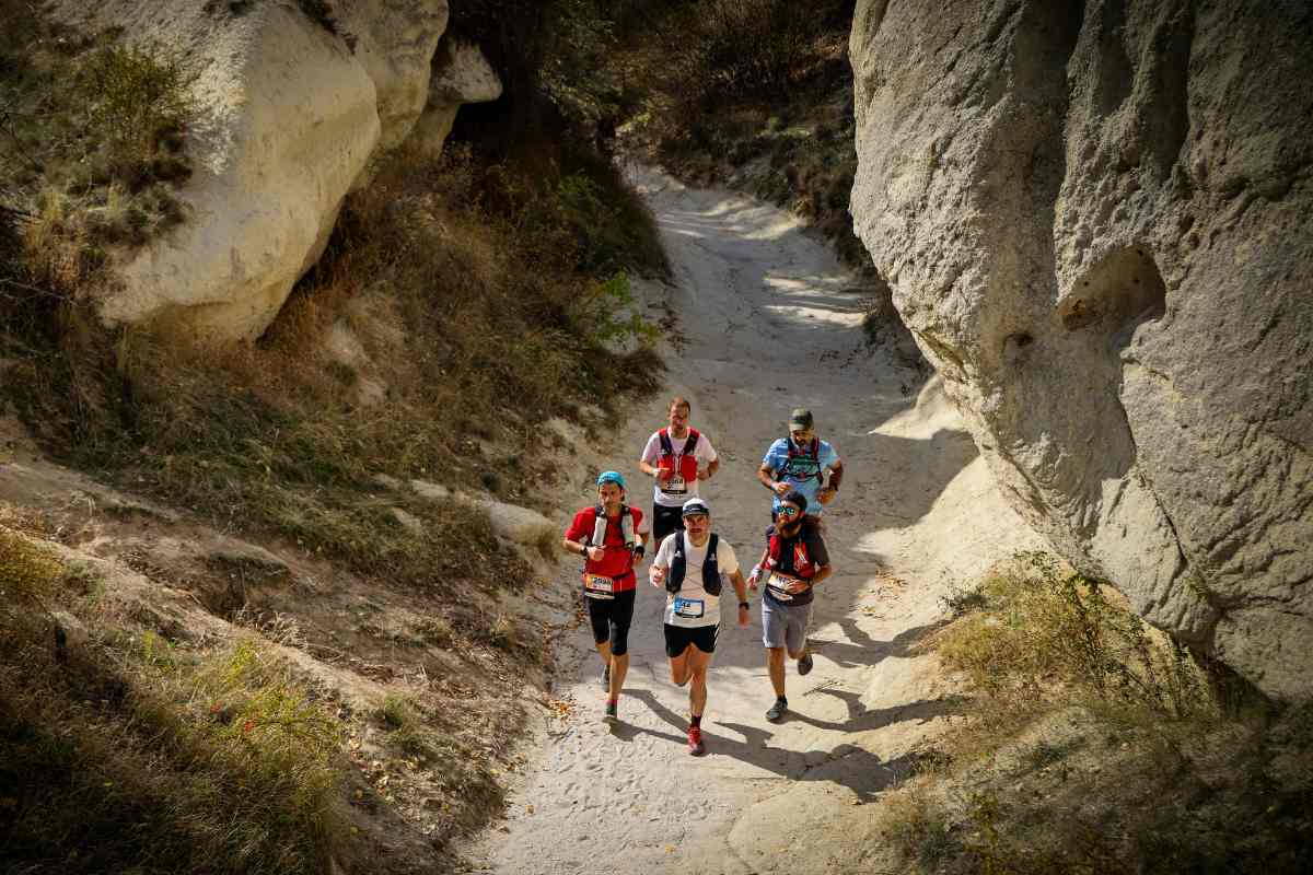 Runners do a workout of uphill sprints