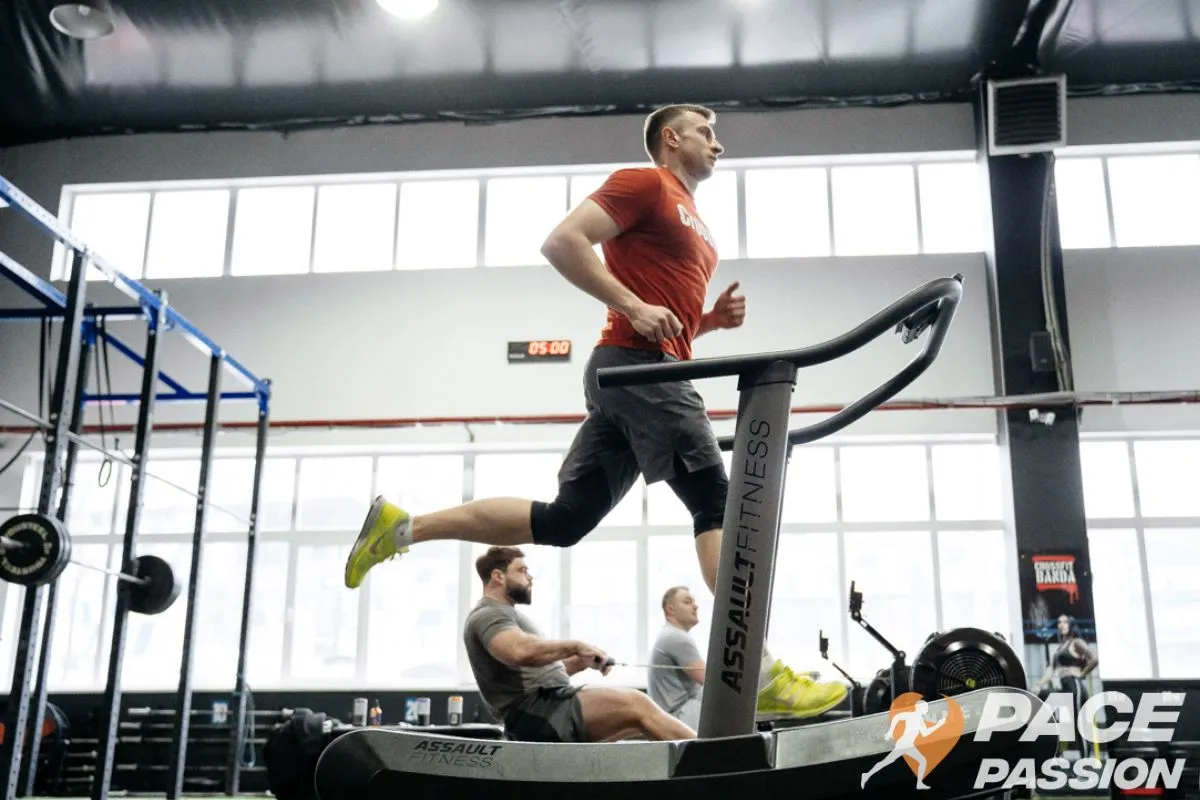 Tall man running on a treadmill designed for taller runners